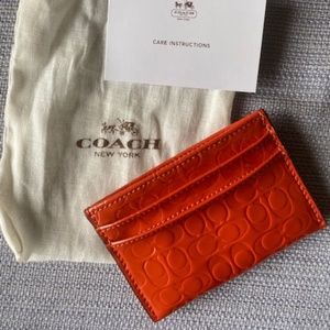 Coach orange leather card holder
